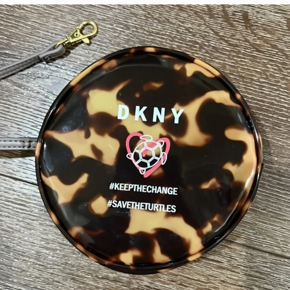 DKNY save the turtle wristlet in excellent condition